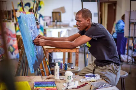 man in art class