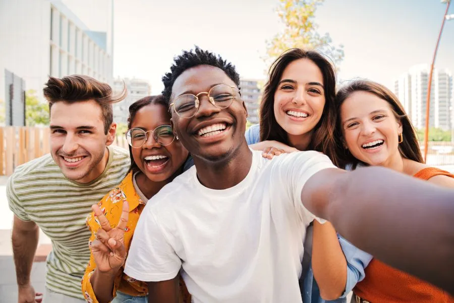 Students take a group selfie