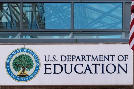 Photo of the Dept of Ed Building and sign