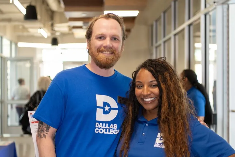Employees stop for a photo at the West Dallas Center
