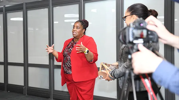 Speaker surrounded by audience