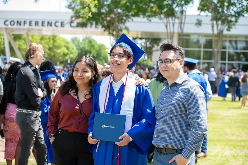 Photo of Male Grad with Family