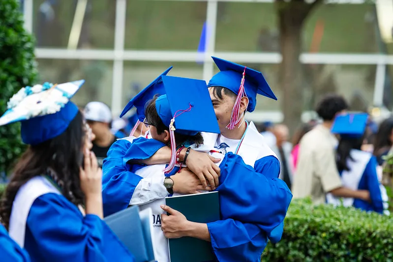 Group of Hugging Grads