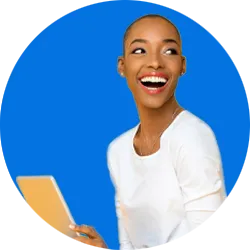A student on her laptop on a patterned background