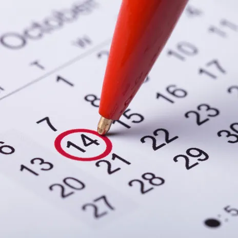 A red pen circling October 14 on a calendar page