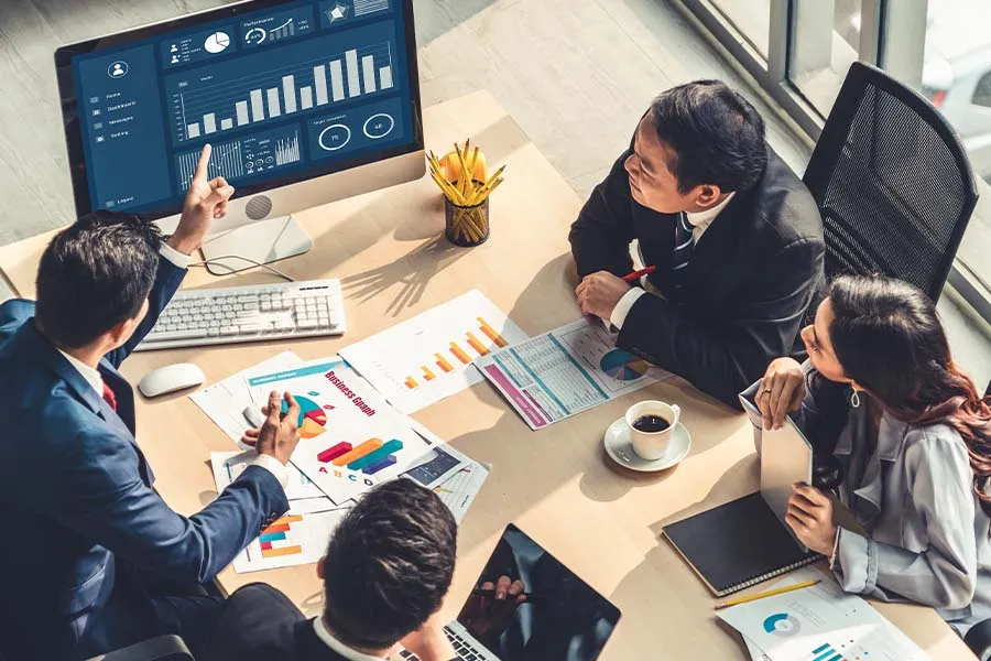 Overhead view of business professionals conducting a meeting