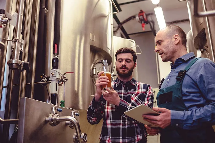Journeyman and technical brewers in a brewery
