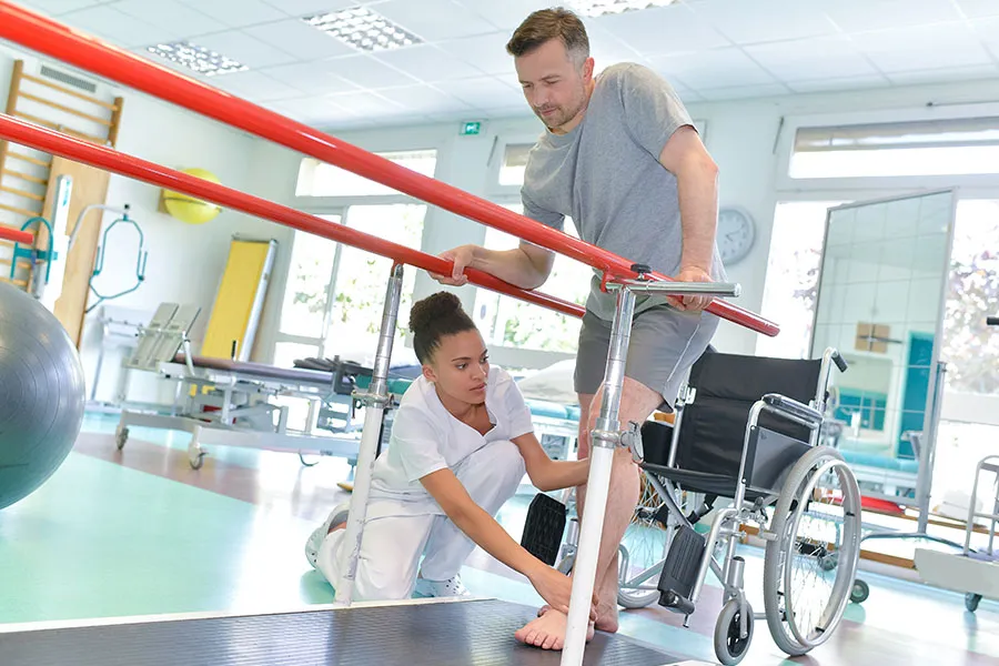 Occupational therapist with wheelchair patient
