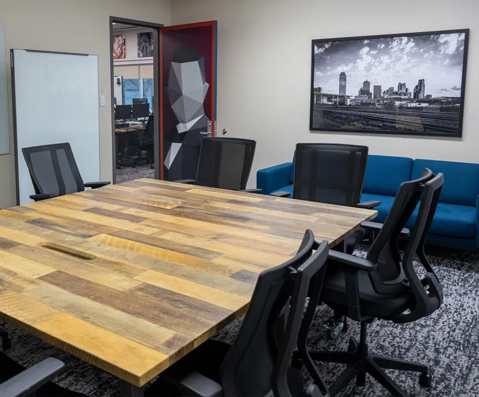 An empty table in a conference room in the Venture Club