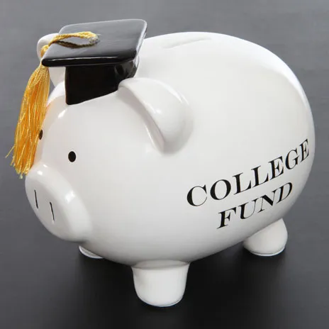 college fund written on piggy bank with graduation cap