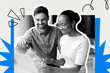 two people looking at a laptop, and two other people looking at an open notebook