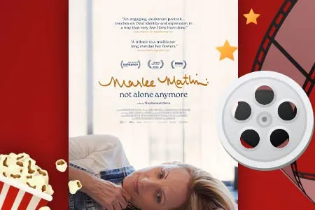movie poster for "Marlee Matlin: Not Alone Anymore" with a container of popcorn and a film reel