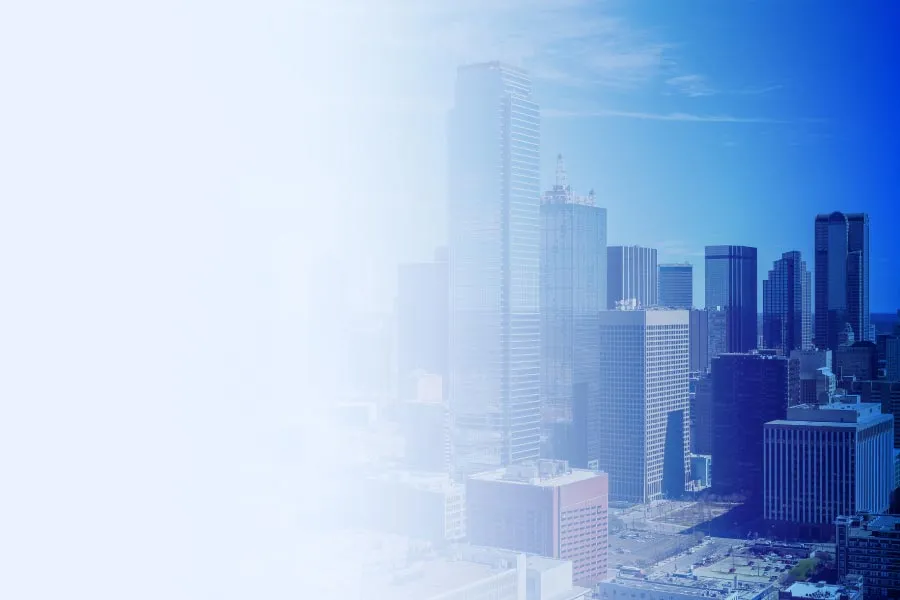 the Dallas skyline fading to white on one side