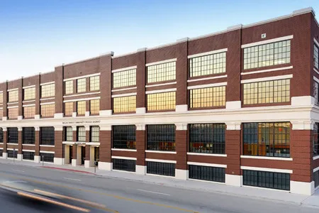 a three-story red brick building