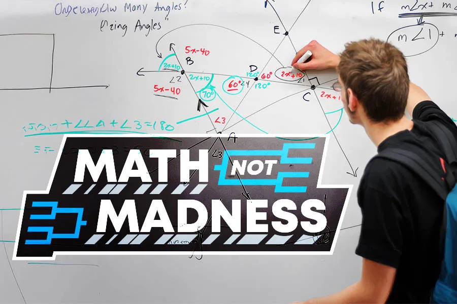 a student writes math equations on a white board that has the words MATH NOT MADNESS on it