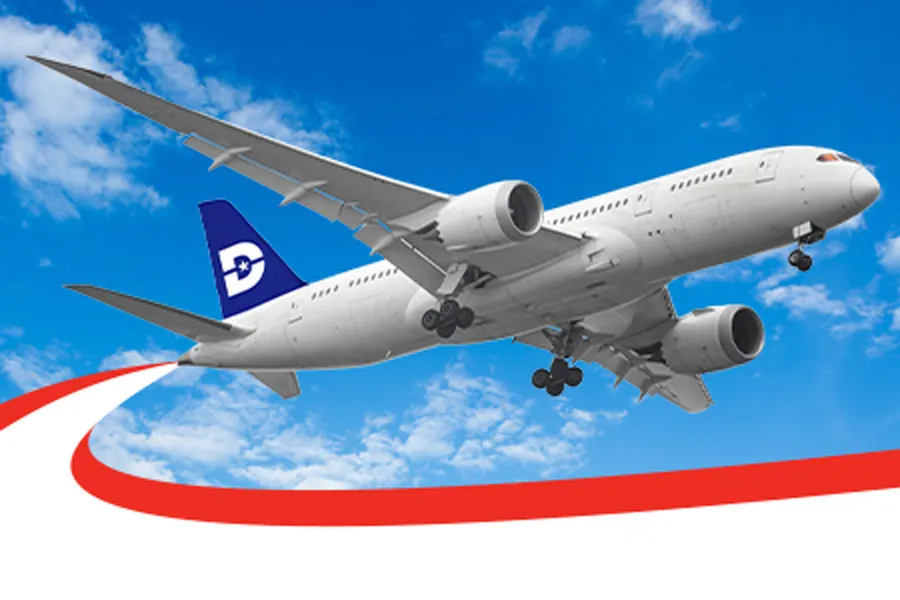 a plane in flight with a Dallas College logo on its tail