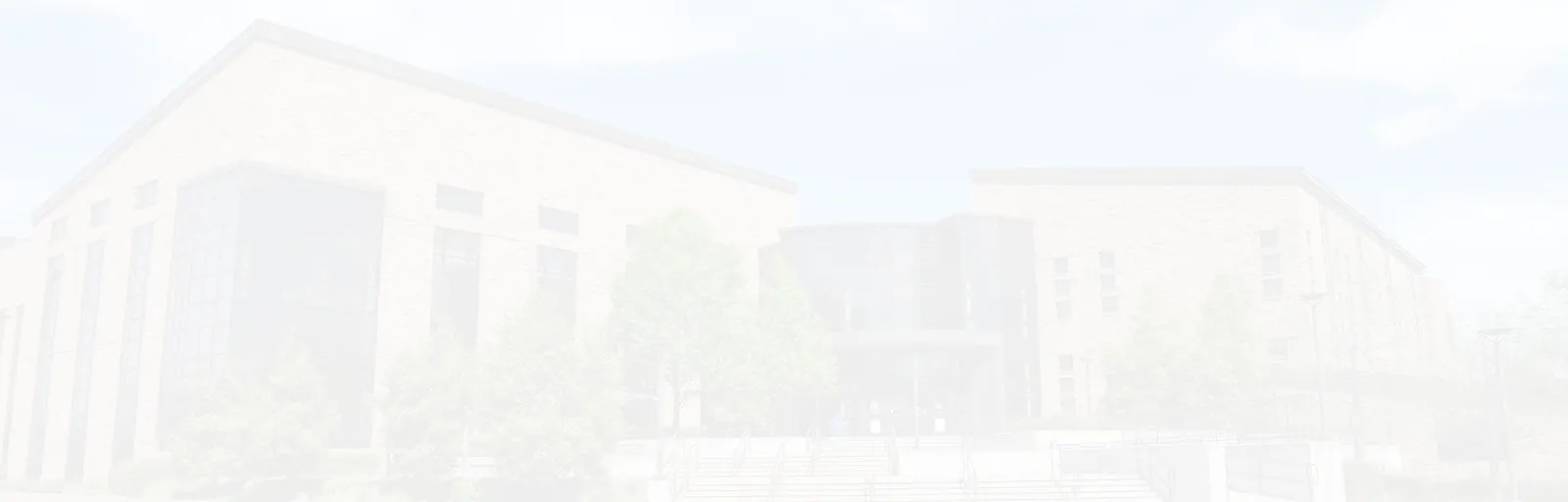 A faded picture of the Brookhaven X building main entrance