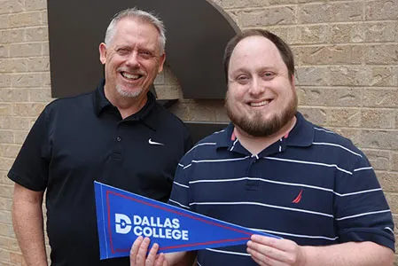 https://pxl-dallascollegeedu.terminalfour.net/fit-in/filters:format(webp)/prod01/dc1-cdn-pxl/media/dallas-college/content-assets/images/news/2023/Kidd_Grad11-450X300-thumb.jpg