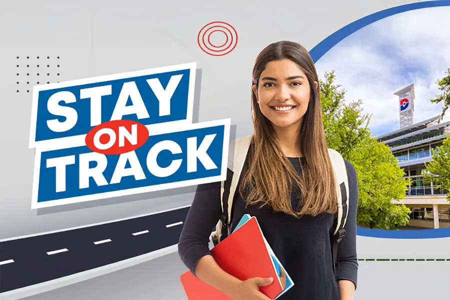 Student standing in front of Stay on Track message