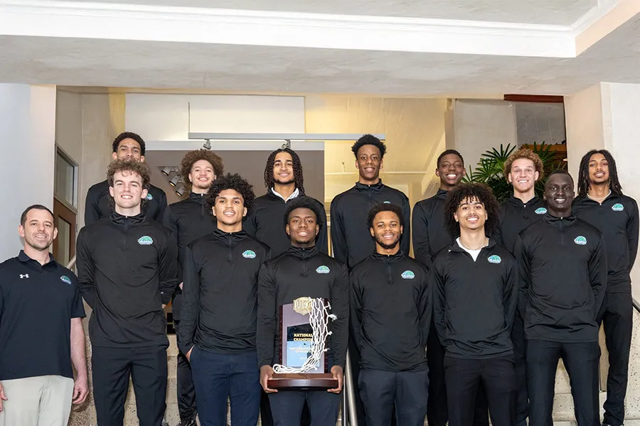 North Lake 2024 Championship Basketball Team posing on stairs