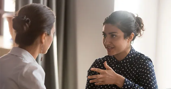 Two people talking one-on-one