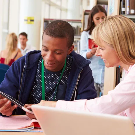 a student success coach helping a college student