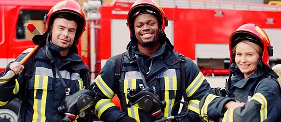 A group of firefighters smile