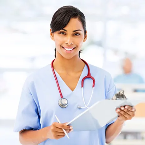 A nurse holds a chart in a clinic