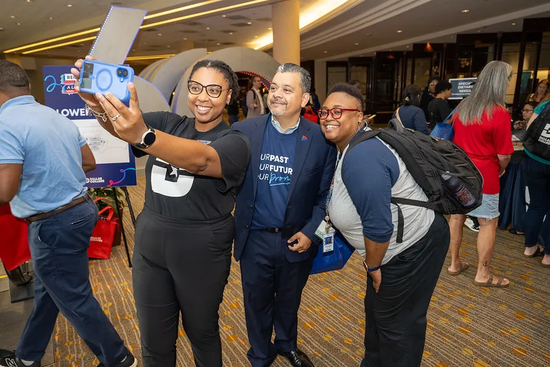 Employees take a selfie at Conference Day