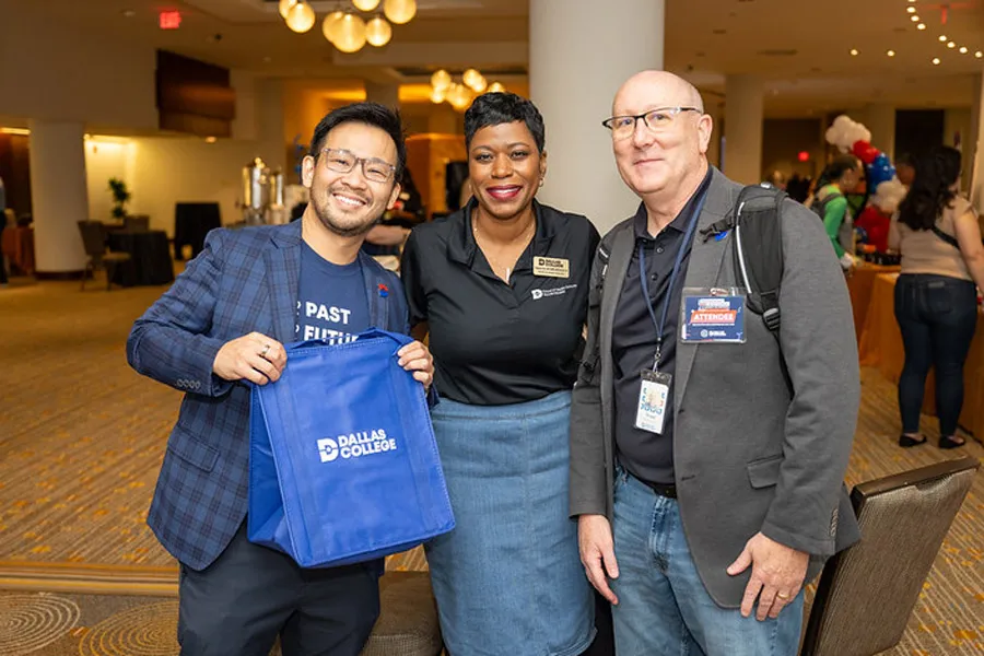 Employees show off Dallas College swag at Conference Day