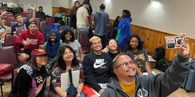 Students take an ussie at a Student Leadership event