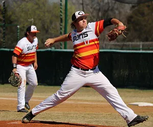 A Cedar Valley pitcher winds up for a pitch
