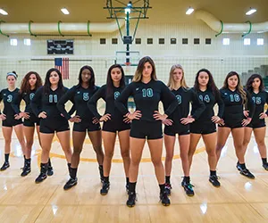 The Brookhaven women's team stands on the court with hands on their hips