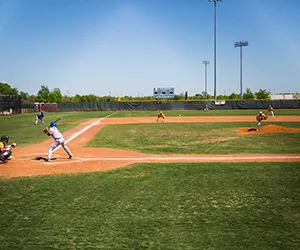 The Mountain View baseball team plays a game with a batter at home ready to swing