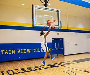 A Mountain View basketball player goes for a layup