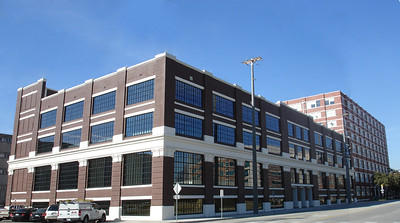 The DCCCD headquarters in 2009 as workers finish preparations on the building before move in.