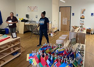 Teachers walk through the classroom at the Bezos Academy preschool at Cedar Valley
