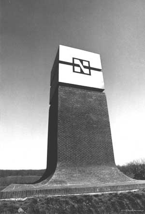 Brick structure with North Lake logo is completed at Walnut Hill Lane entrance.