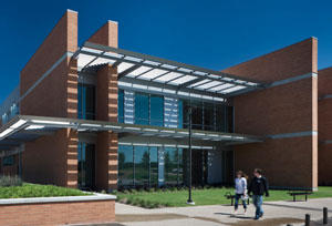 Students walking in front of Richland's new Sabine Hall