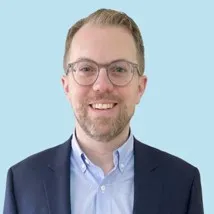 man with glasses in suit