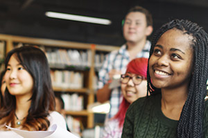 Group of students sitting in a library