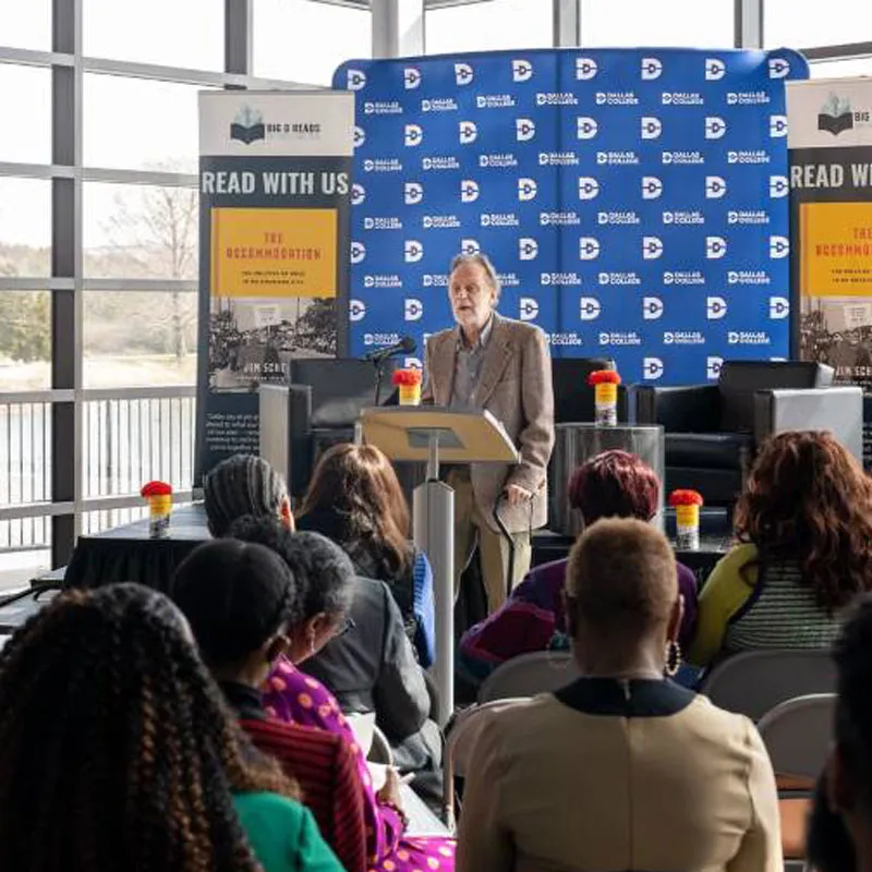 A speaker presents at a community event at Cedar Valley College
