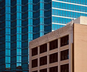 The El Centro A Building is seen in front of the Bank of America Tower in downtown Dallas
