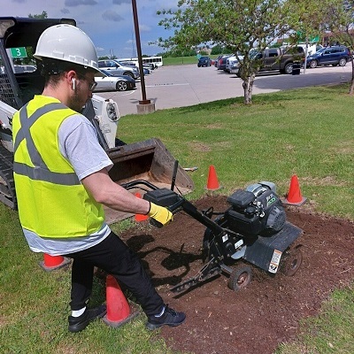 Seff Islam Al-Ghafry operates tiller.