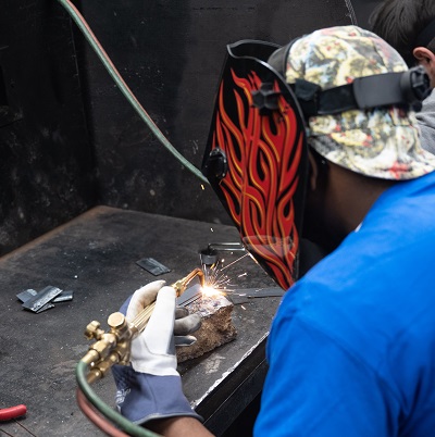 Caleb Lynn welding.