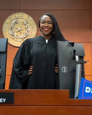 Judge Vonda Bailey standing behind the bench.