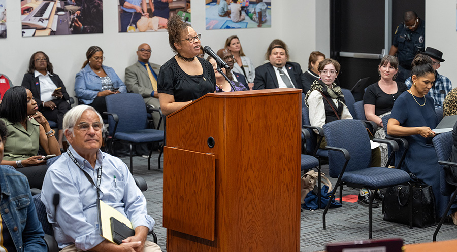Krystal Morrow speaking during the board of trustees meeting.
