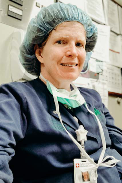 Dr. Caroline Ferris wearing scrubs.