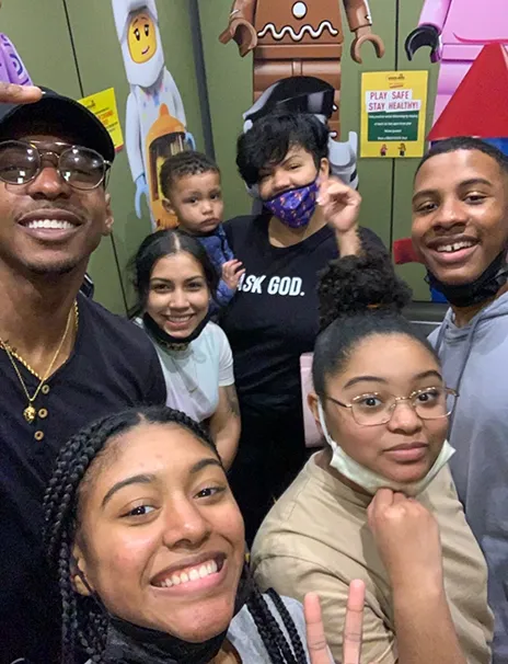 Cichez Dounley with six young family members.