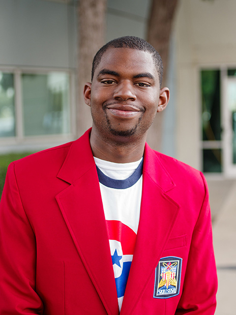 Tairan Lockett wears a white Dallas College shirt and a red SkillsUSA blazer.